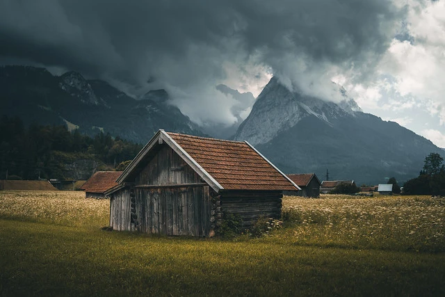 Tiny cabin on a field on a rainy day in Garmisch Patenkirchen
