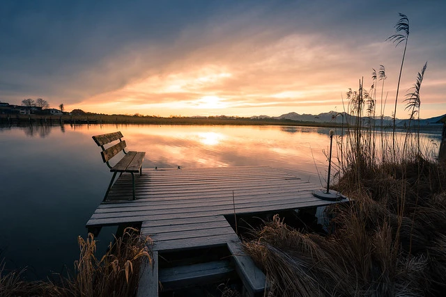 Bench on a plank at lake Chiemsee