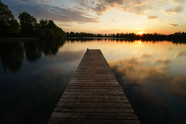 Sunset mirror at a small bavarian lake